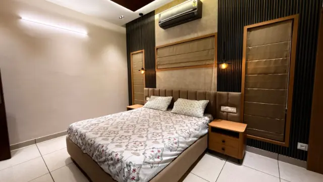 Guest Bedroom, Contemporary style from Modern Home Interior Design with Modular Kitchen & Elegant Living Spaces in Thalassery by iDIZ interiors